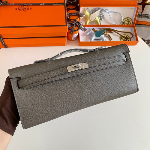 HERMES KELLY CUT 31 IN WOOD BROWN CALFSKIN WITH SILVER HARDWARE