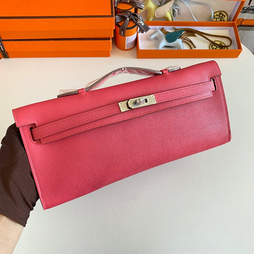 HERMES KELLY CUT 31 IN WATERMELON PINK CALFSKIN WITH SILVER HARDWARE