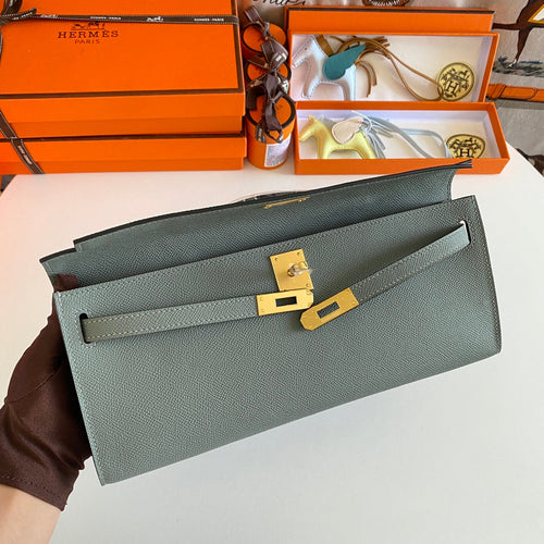 HERMES KELLY CUT 31 IN SEAFOAM GREEN CALFSKIN WITH GOLD HARDWARE
