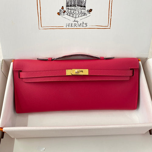 HERMES KELLY CUT 31 IN CHERRY RED CALFSKIN WITH GOLD HARDWARE